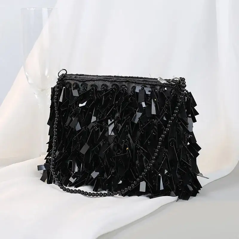 Glamorous Detail: Rhinestone Tassel Messenger Bag