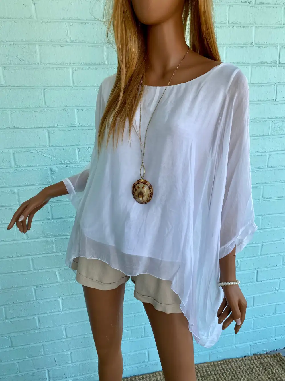 Relaxed Sleeveless Poncho