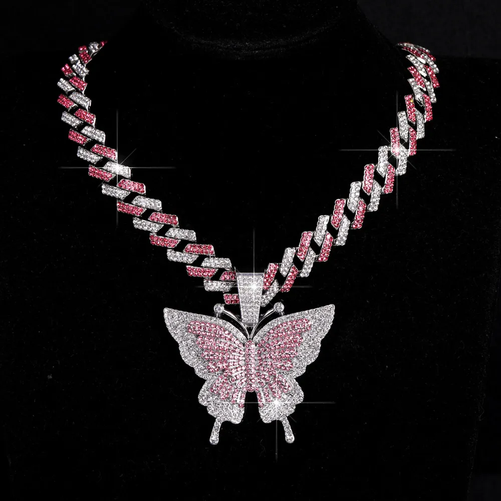 🦋 MAKE YOUR LOOK HIT DIFFERENT. ✨  Turn heads with an Iced-Out Butterfly Pendant that brings serious shine to every fit. Bold Cuban-link style. Statement butterfly design. Maximum sparkle from every angle. 💎