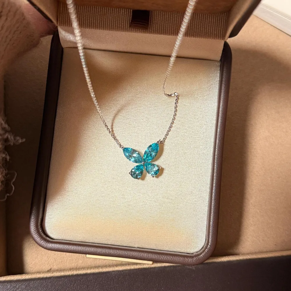 🦋 A little sparkle can change the whole look.  This stunning blue butterfly necklace catches the light beautifully from every angle. Delicate, elegant, and effortlessly eye-catching — perfect for adding a touch of color to your everyday style. ✨
