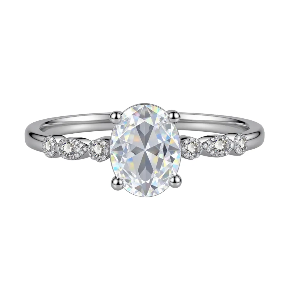 Elegant, delicate, and effortlessly beautiful. This oval gemstone ring features a brilliant faceted center stone surrounded by sparkling accents for a timeless, feminine look.