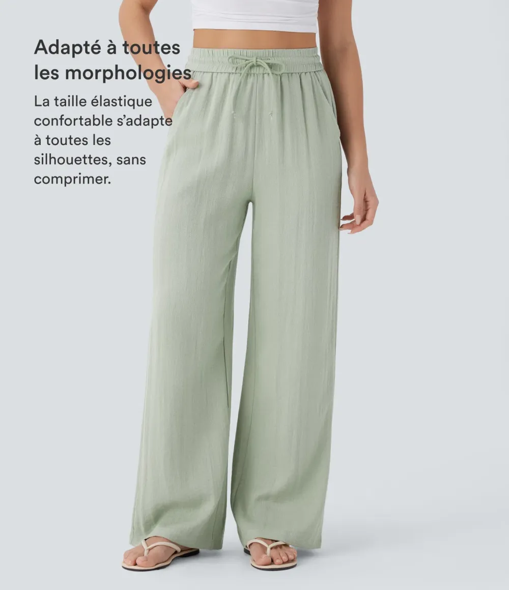 2026🔥  Wide-leg, flowing, high-waisted trousers with drawstring, side pockets and a linen look