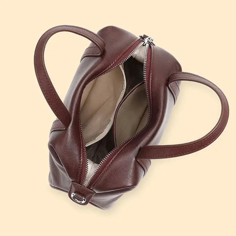 Luxe Craft: Premium Cowhide Leather Bowling Handbag