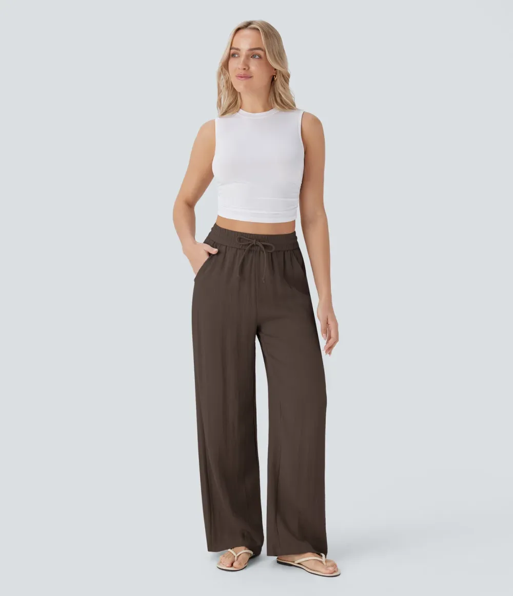 2026🔥  Wide-leg, flowing, high-waisted trousers with drawstring, side pockets and a linen look