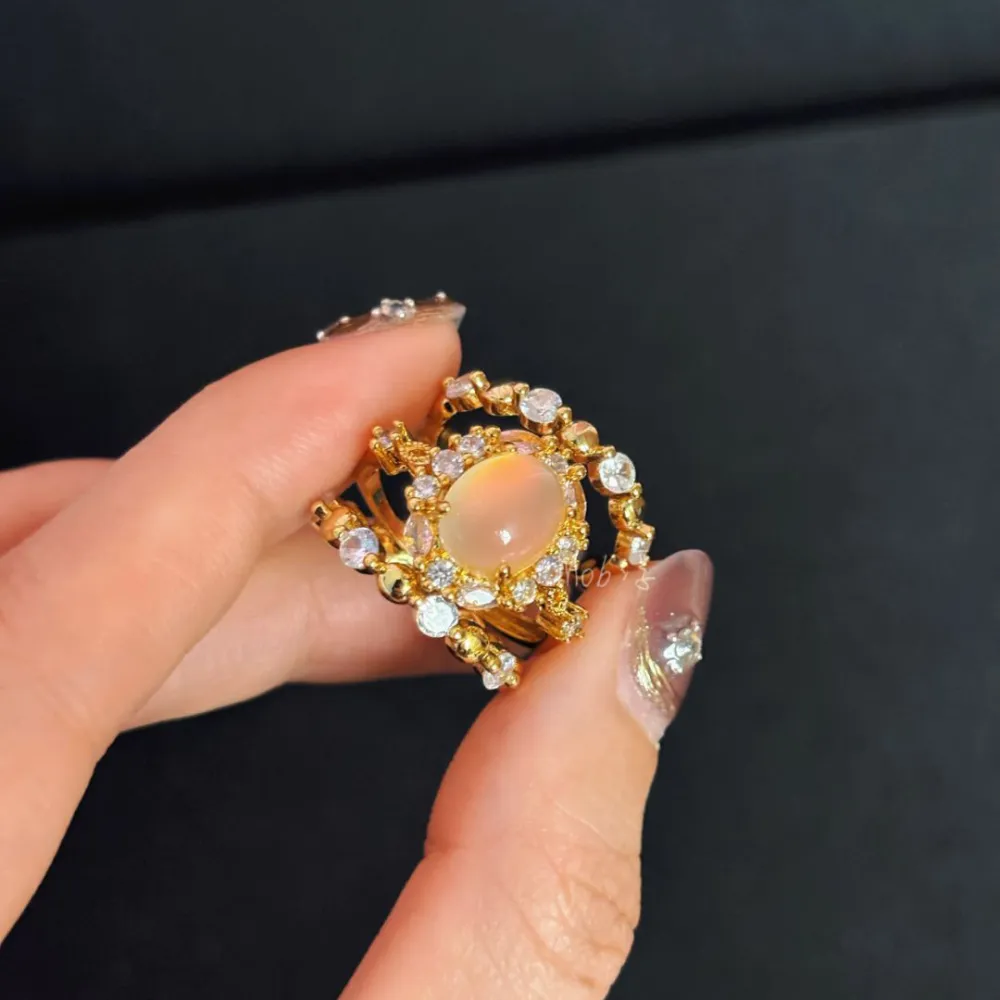 ✨ A little vintage glamour for your everyday look.  The dreamy blush-pink center stone catches the light beautifully, surrounded by sparkling accents and delicate gold-tone details. 💕 Elegant, romantic, and impossible to ignore.