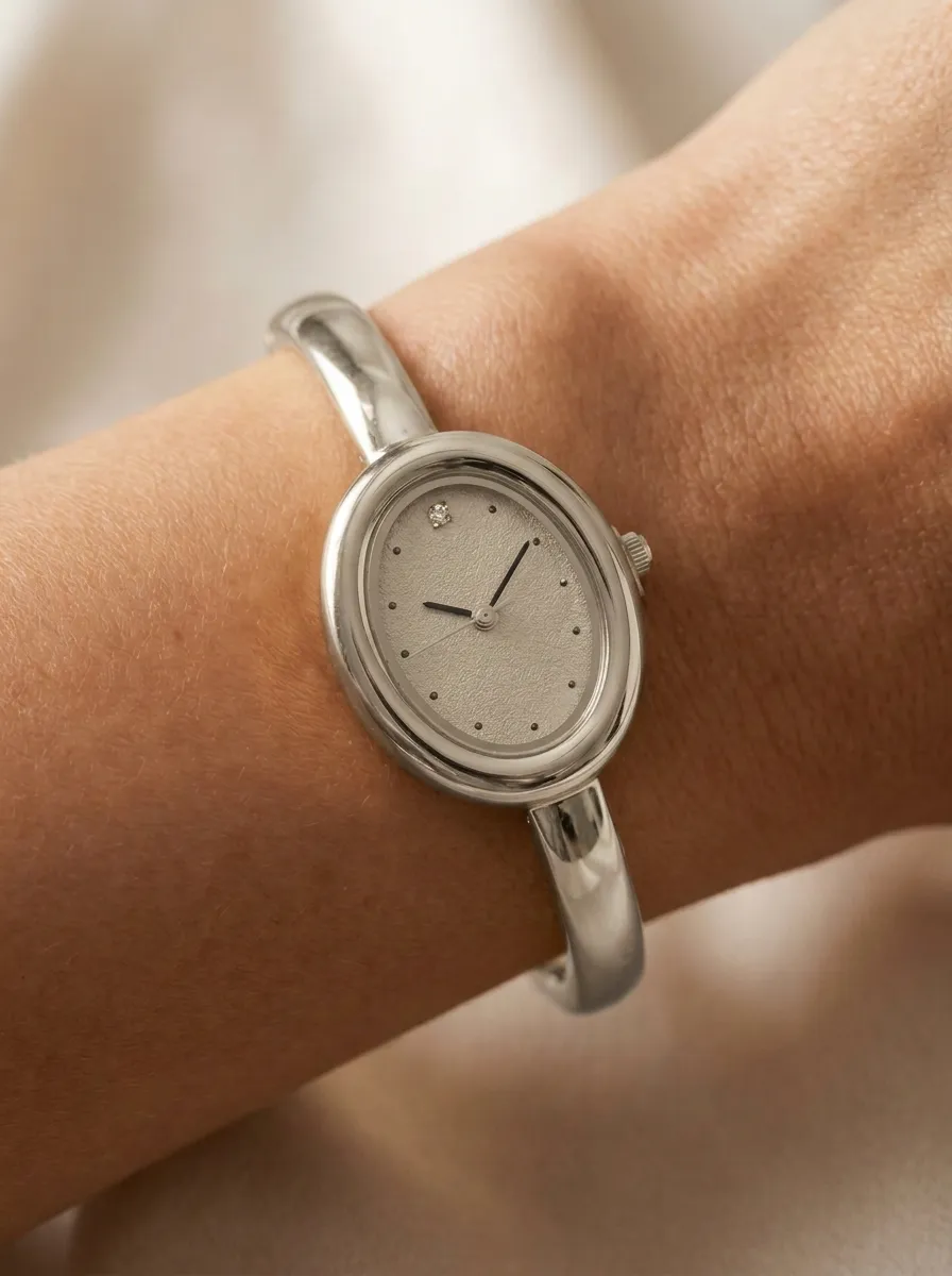 Women's Minimalist Gold Oval Diamond Dial Bangle Watch