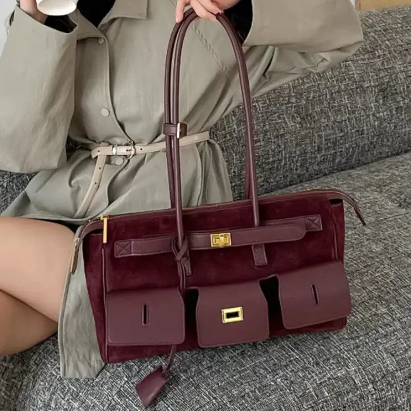 Statement Detail: Genuine Leather Buckle-Handle Handbag