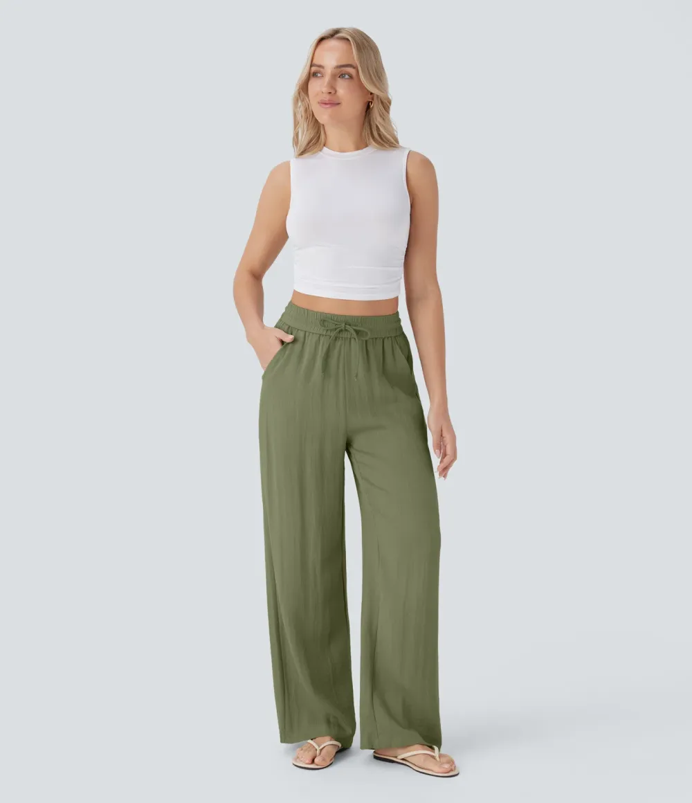2026🔥  Wide-leg, flowing, high-waisted trousers with drawstring, side pockets and a linen look
