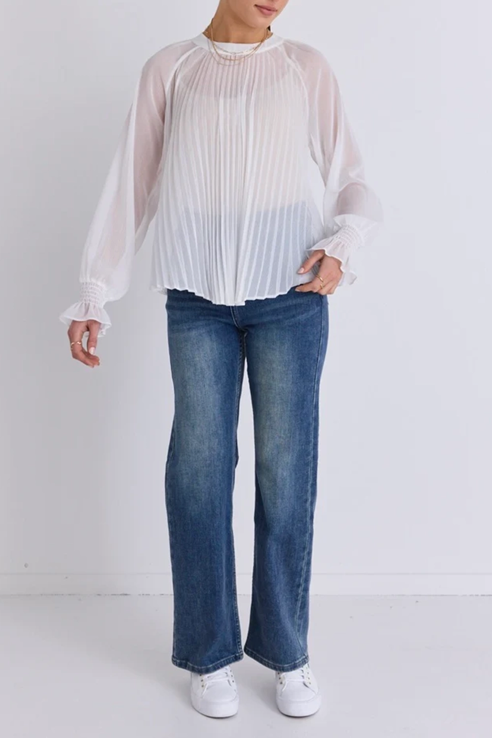 White Sheer Top Paired Jeans