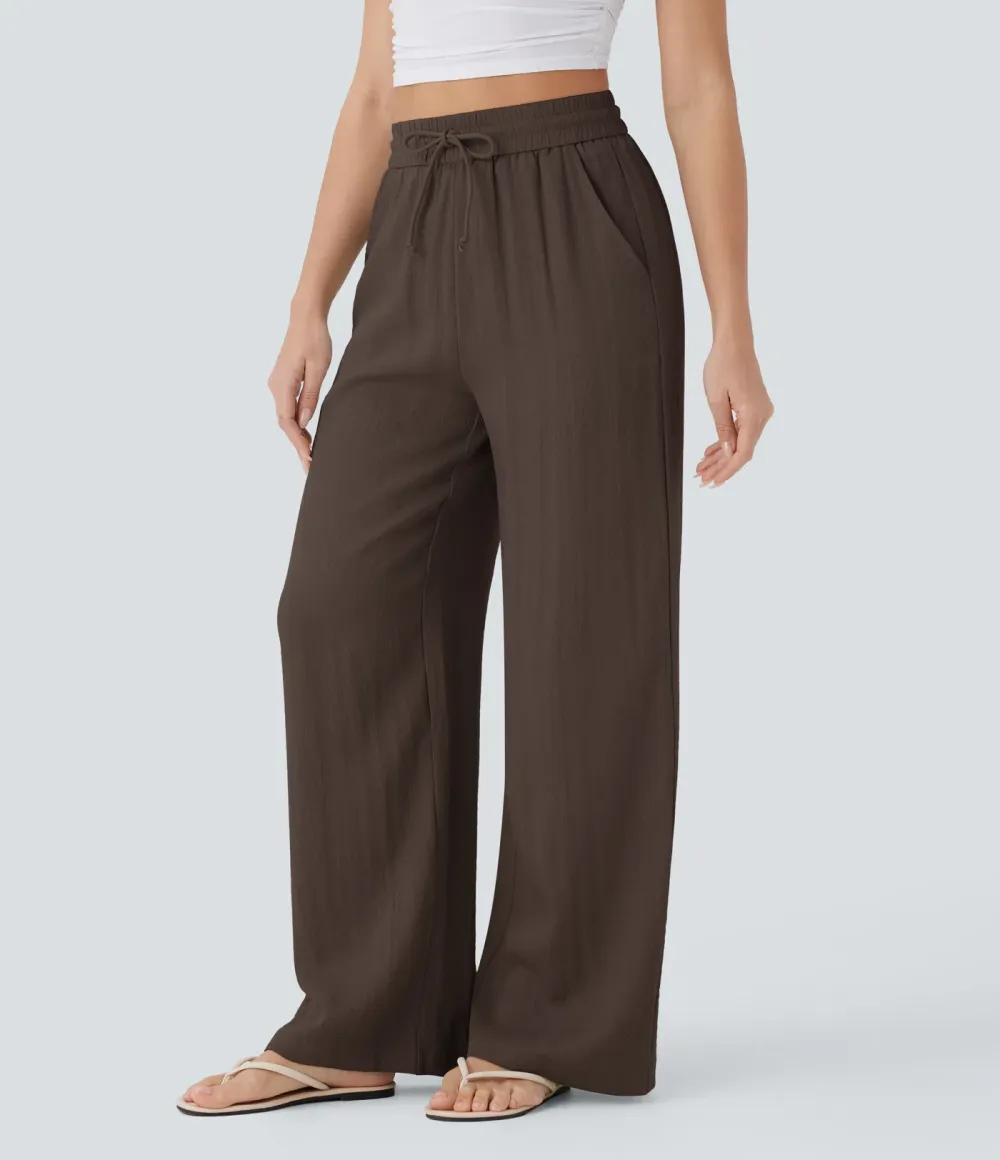 2026🔥  Wide-leg, flowing, high-waisted trousers with drawstring, side pockets and a linen look