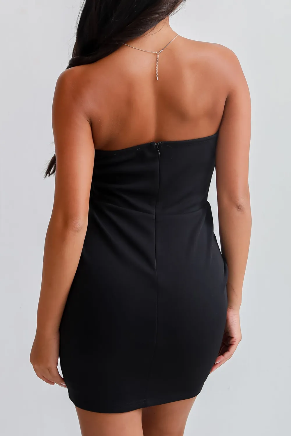 Under Stadium Lights Strapless Bow Mini Dress