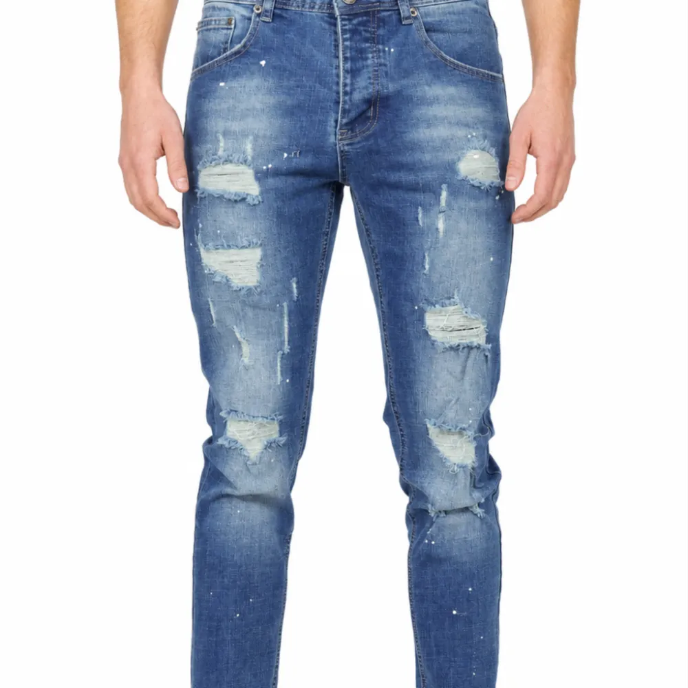 Modern Distressed Slim Fit Paint Splatter Five Pocket Jeans