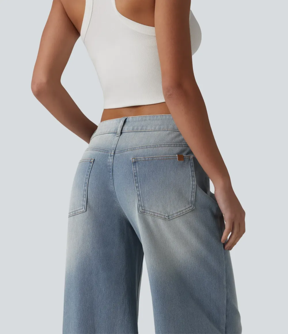 2026🔥  Low-rise wide-leg asymmetric jeans with button, zip, and multiple pockets; stretch knit fabric with a washed finish.