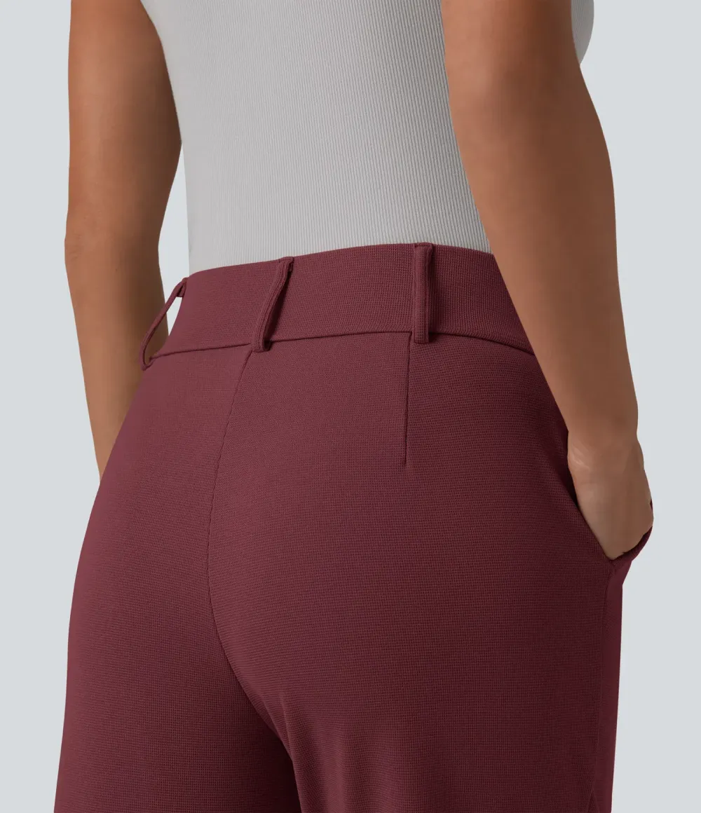  - Tapered office trousers with a high waist, side pockets and waffle fabric