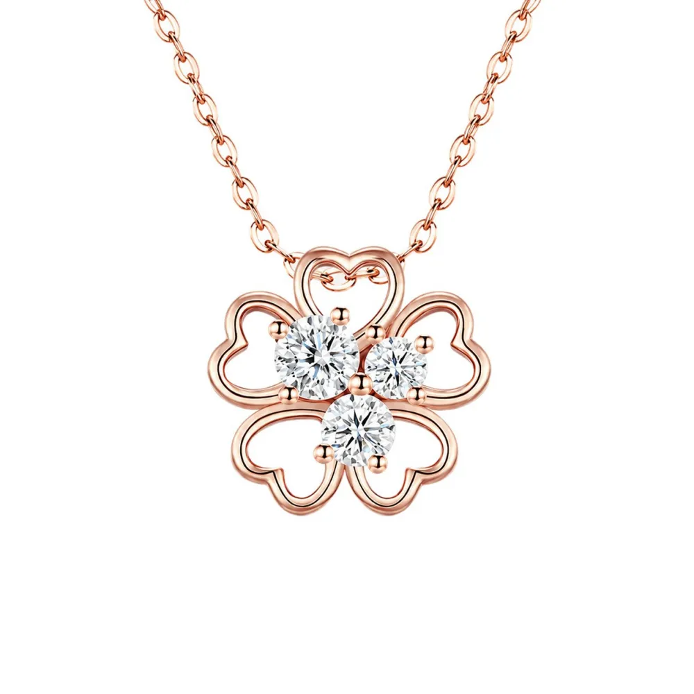 Designed with four delicate heart-shaped petals and sparkling stones, this elegant clover necklace adds the perfect finishing touch to any look.
