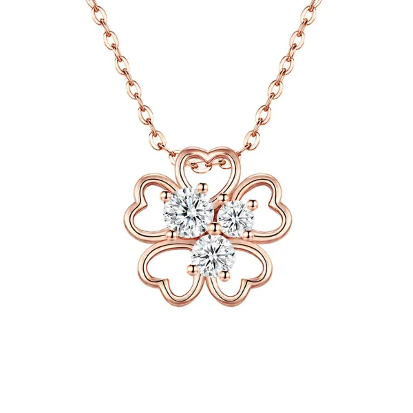 Designed with four delicate heart-shaped petals and sparkling stones, this elegant clover necklace adds the perfect finishing touch to any look.
