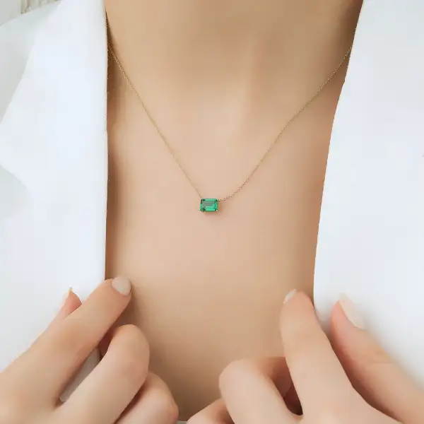 Delicate Emerald Cut Solitaire Emerald Necklace