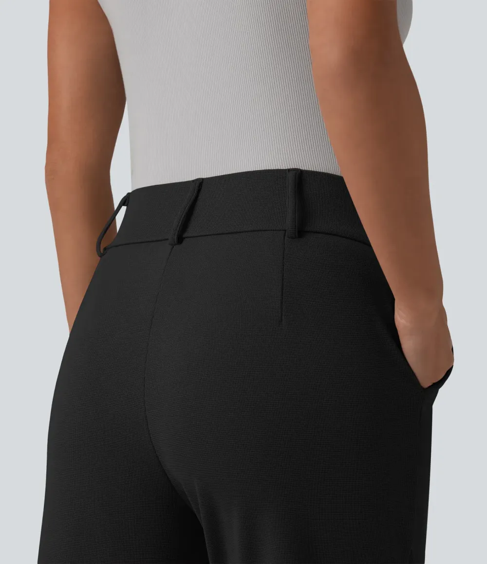  - Tapered office trousers with a high waist, side pockets and waffle fabric