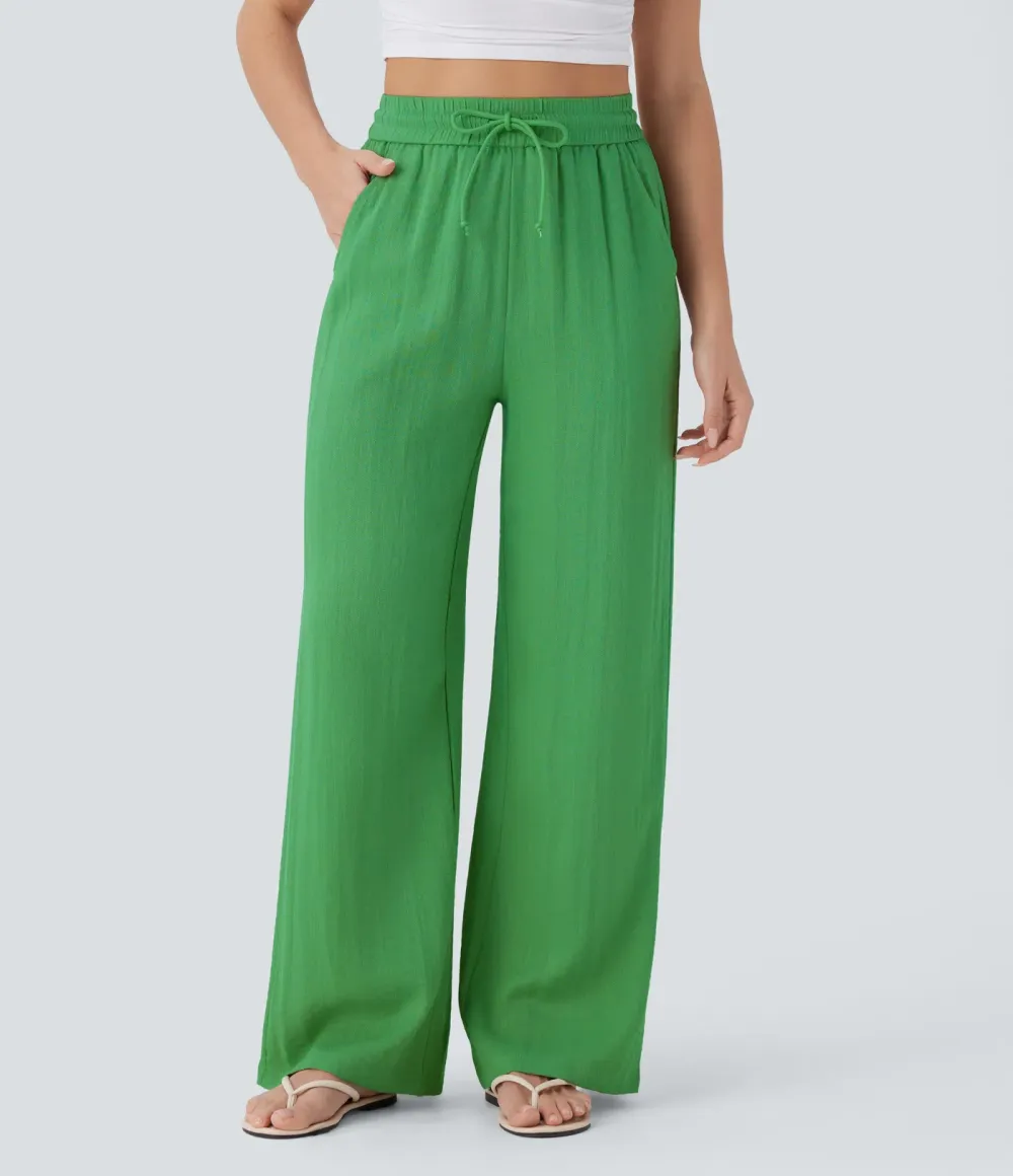 2026🔥  Wide-leg, flowing, high-waisted trousers with drawstring, side pockets and a linen look