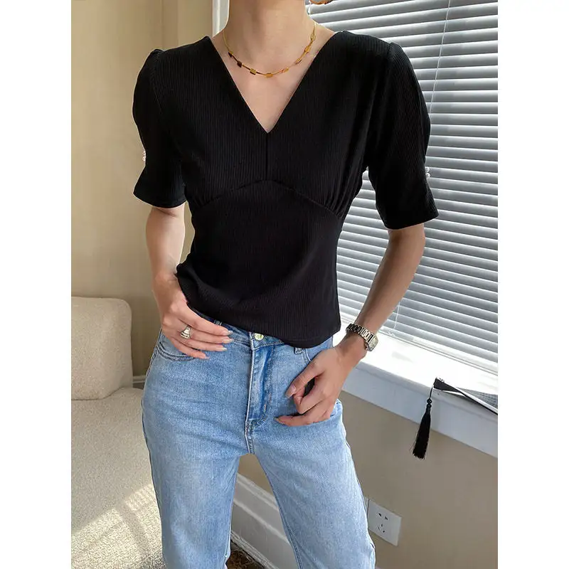 Streamlined V-Neck Pearl Button Sleeveless T-Shirt