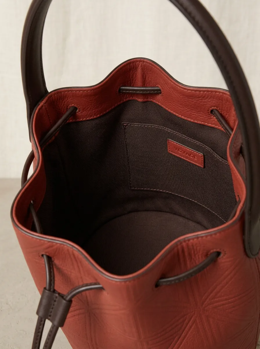 Women's Geometric-Embossed Tassel-Detail Drawstring Bucket Bag