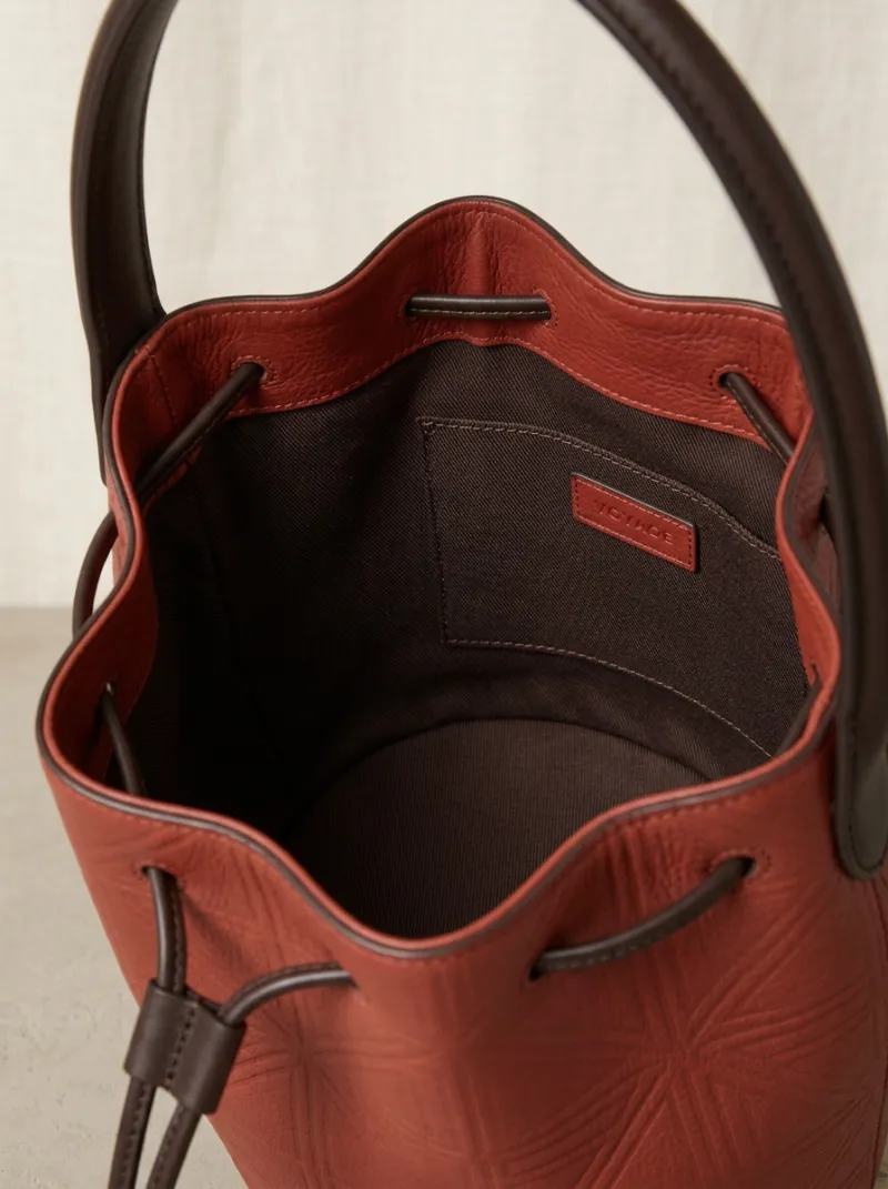Women's Geometric-Embossed Tassel-Detail Drawstring Bucket Bag