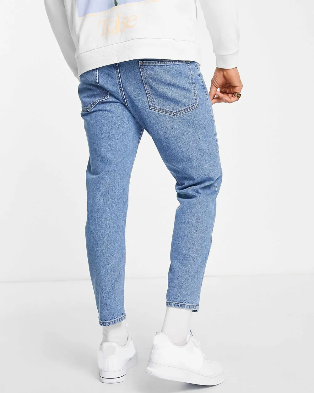 Tapered Fit Jeans In Mid Wash Blue