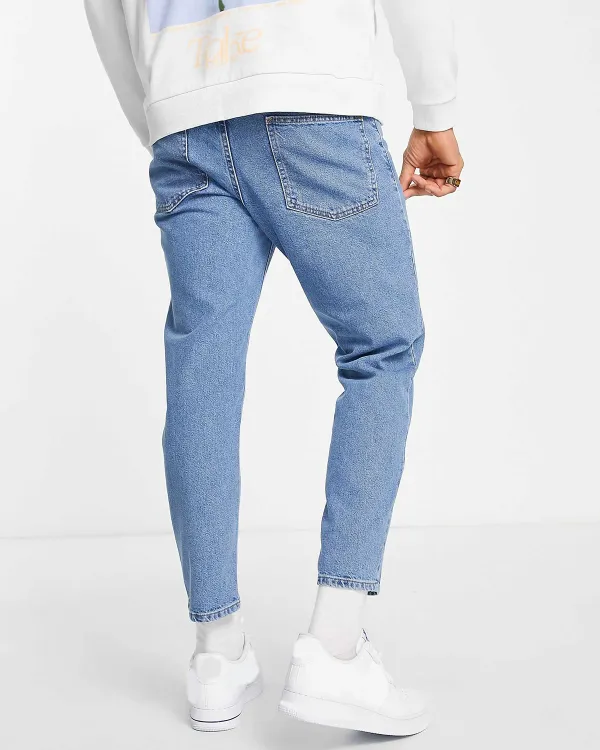 Tapered Fit Jeans In Mid Wash Blue