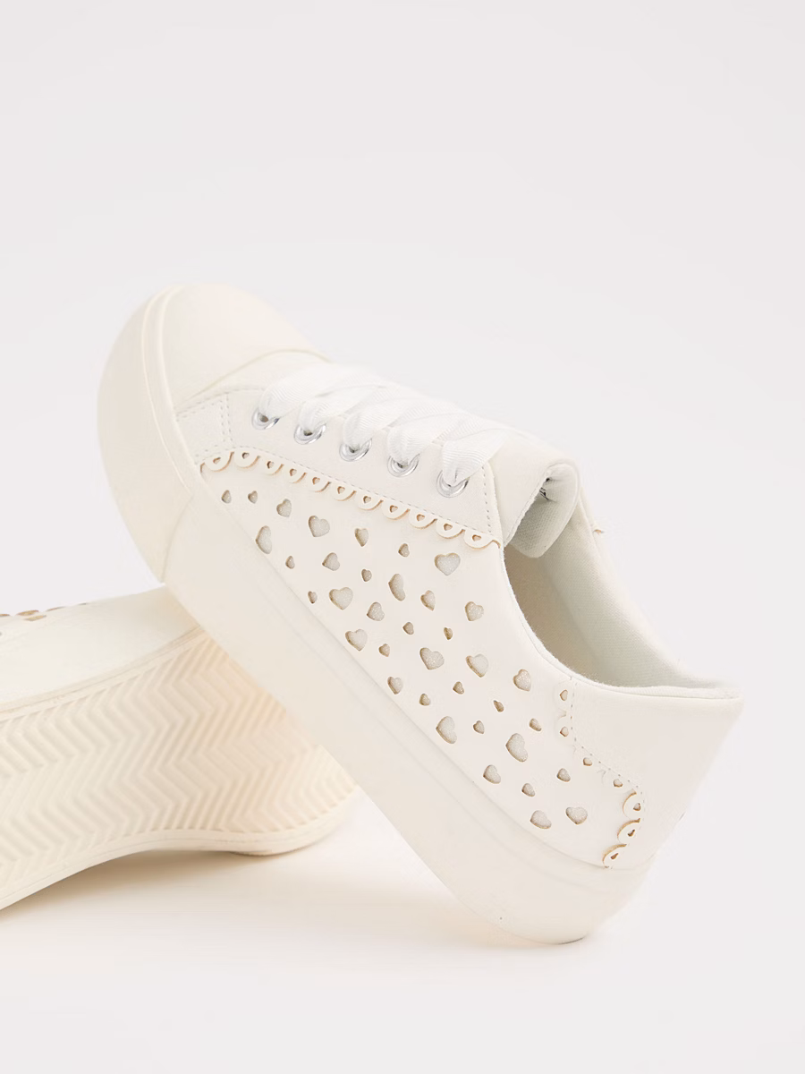 Cream Heart Cut Out Trainers detail 1
