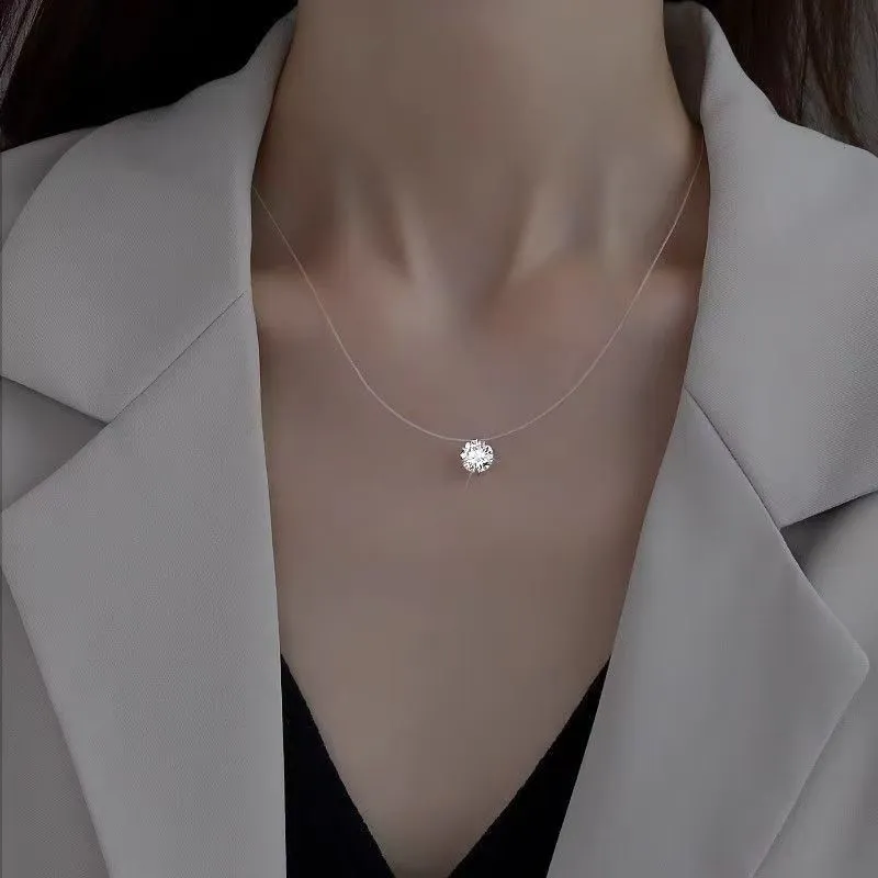 ✨ It looks like it’s floating on your skin. A barely-there clear necklace paired with a sparkling solitaire pendant creates the perfect minimalist look. Delicate, elegant, and effortless enough to wear every day. 💎  Wear it alone for a clean look or laye