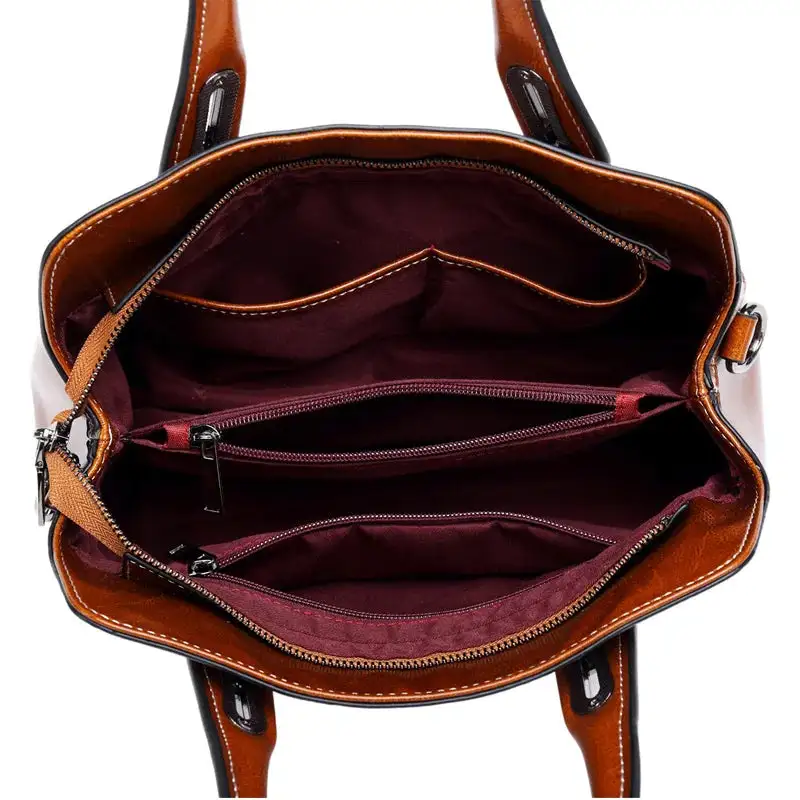 Structured Heritage: Genuine Leather Buckle-Handle Handbag