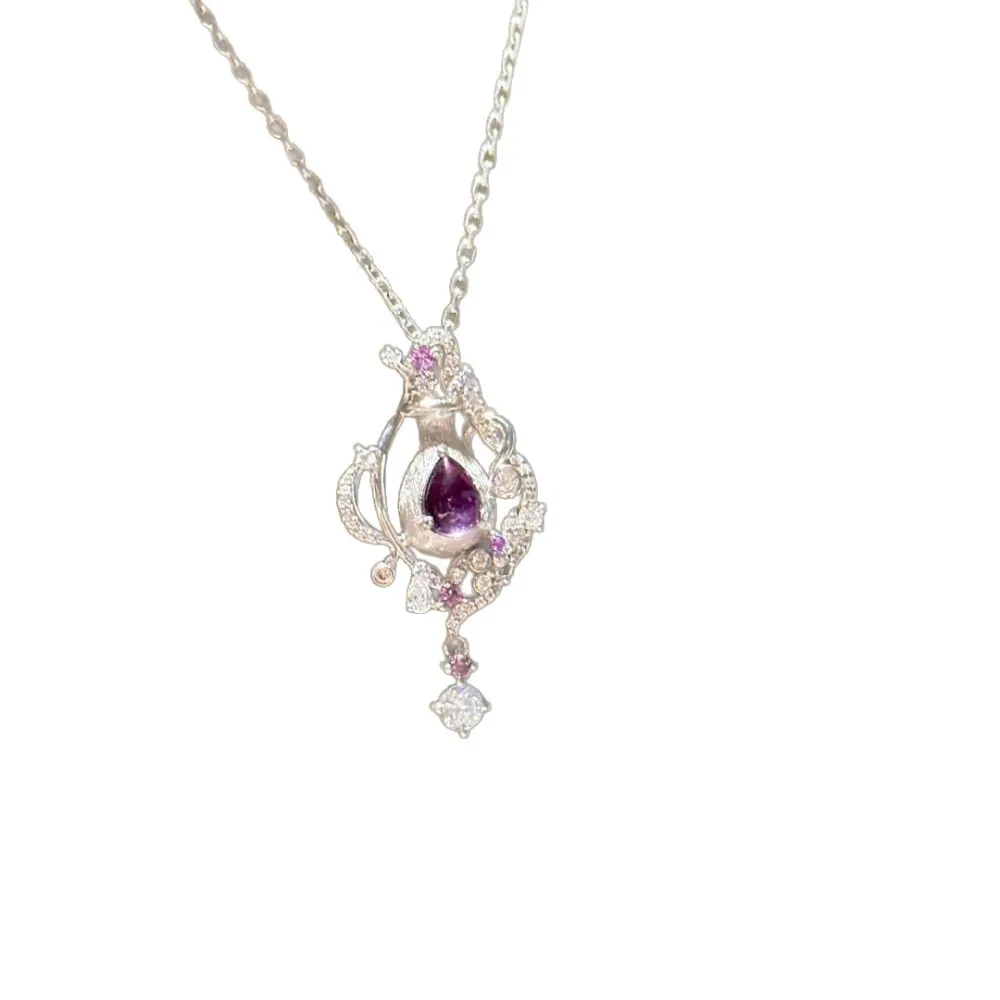 ✨ A little sparkle makes every moment feel special. Featuring a captivating purple teardrop stone surrounded by delicate shimmering details, this necklace adds an elegant touch to any look. 💜  Perfect for date nights, special occasions, or simply treatin
