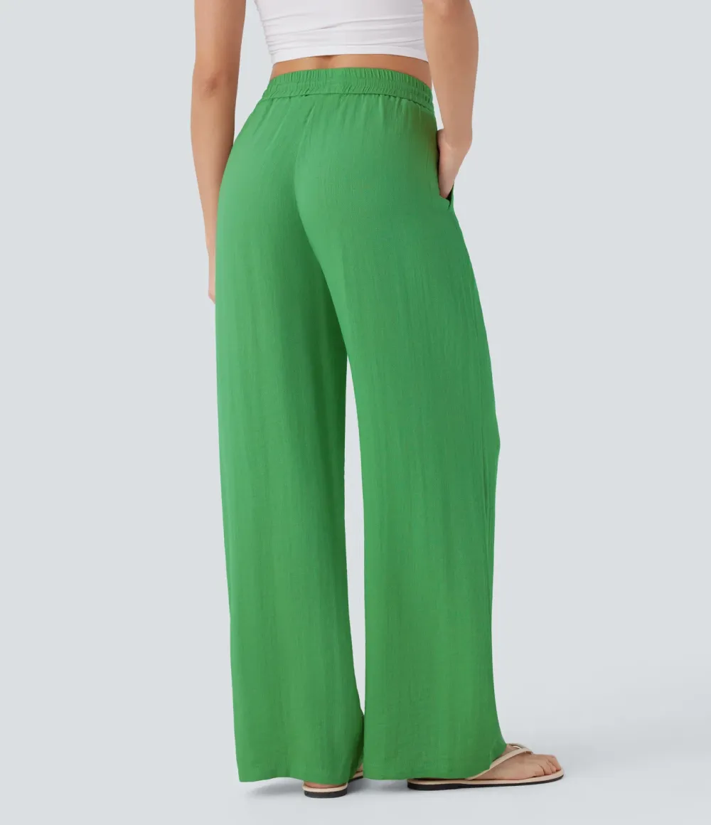 2026🔥  Wide-leg, flowing, high-waisted trousers with drawstring, side pockets and a linen look