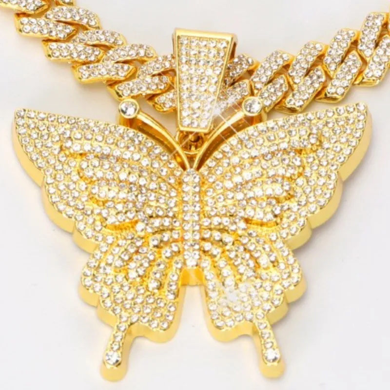 🦋 MAKE YOUR LOOK HIT DIFFERENT. ✨  Turn heads with an Iced-Out Butterfly Pendant that brings serious shine to every fit. Bold Cuban-link style. Statement butterfly design. Maximum sparkle from every angle. 💎