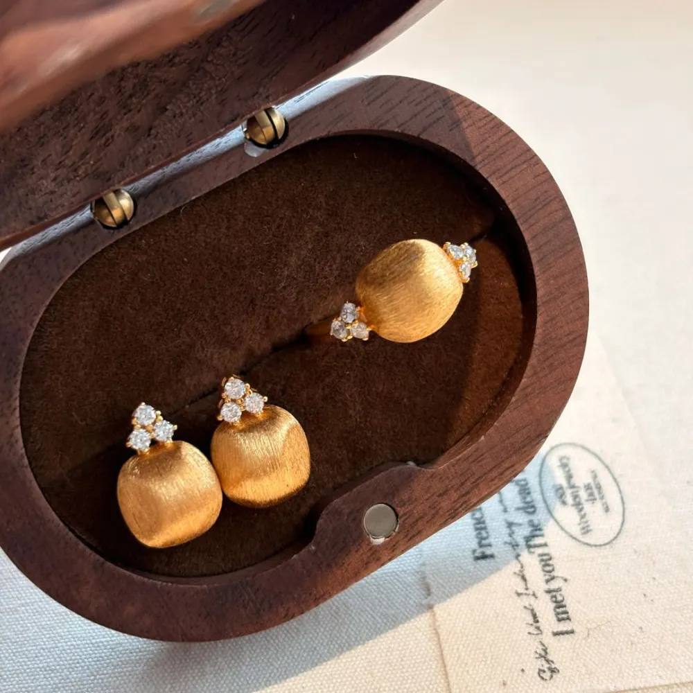 ✨ A little gold makes every day feel special.  Meet the jewelry set that brings effortless elegance to any look. Featuring a beautifully textured gold-tone finish and delicate sparkling accents, each piece catches the light without feeling overly flashy.