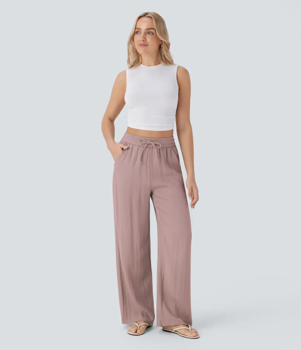 2026🔥  Wide-leg, flowing, high-waisted trousers with drawstring, side pockets and a linen look