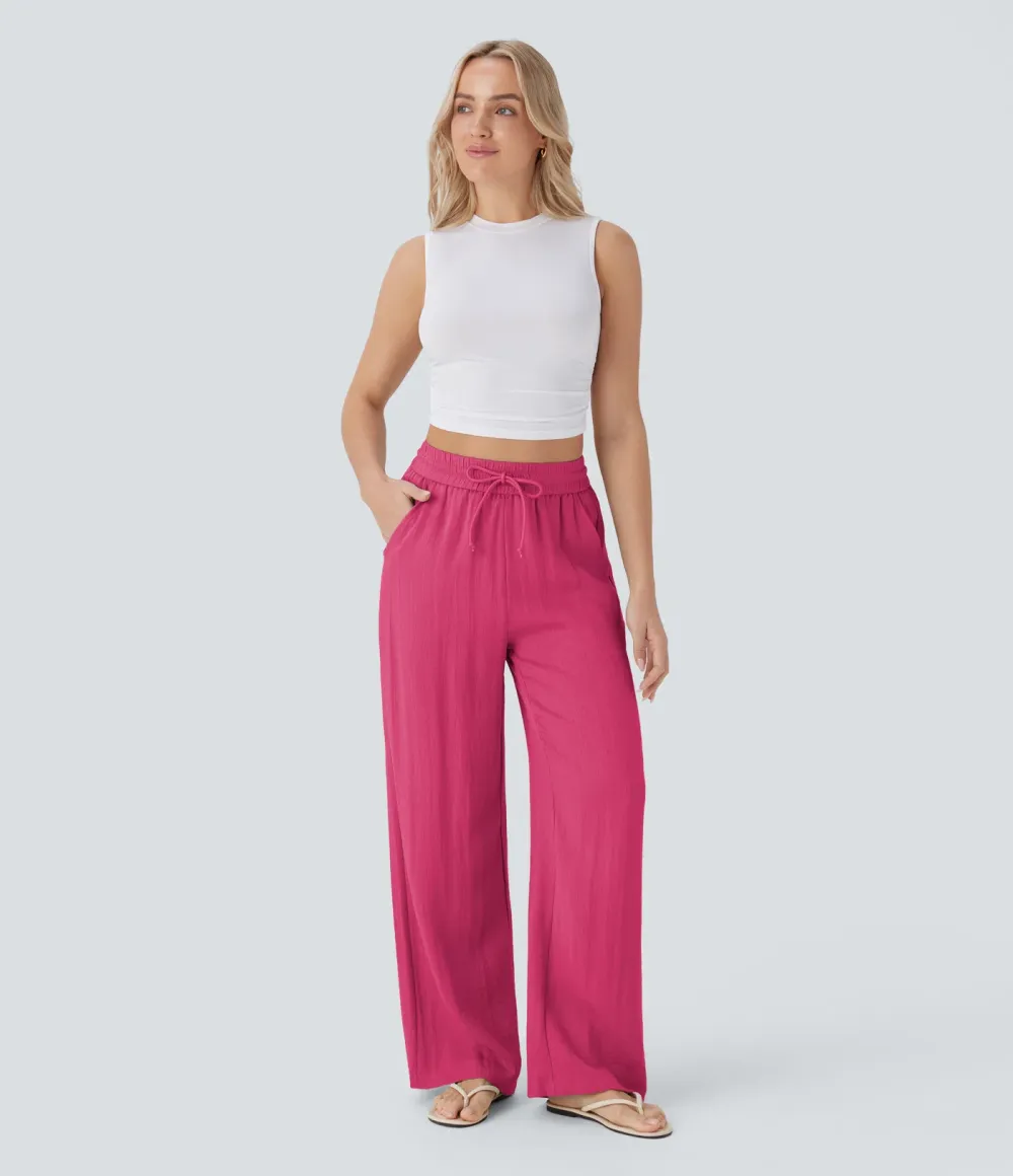 2026🔥  Wide-leg, flowing, high-waisted trousers with drawstring, side pockets and a linen look