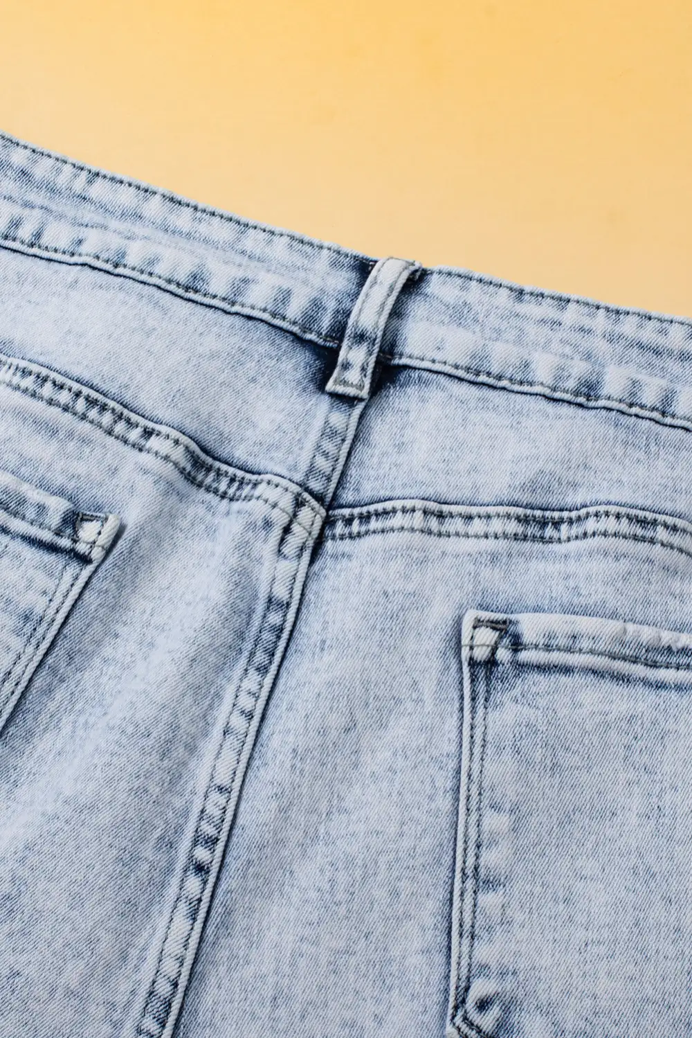 Light Blue Acid Wash Crossed Raw