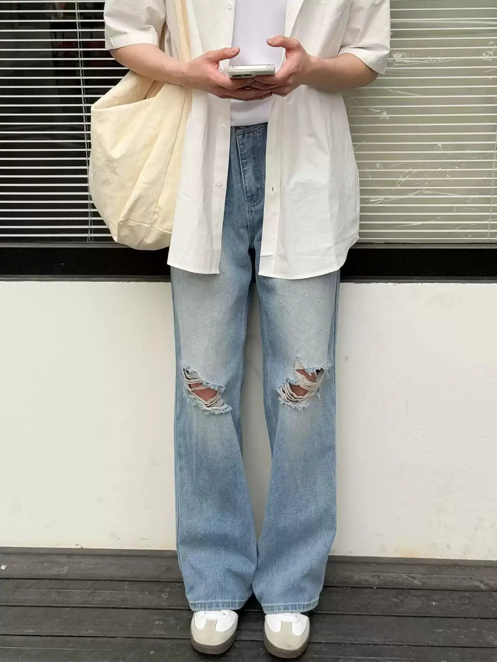 Ripped Knee Faded Jeans