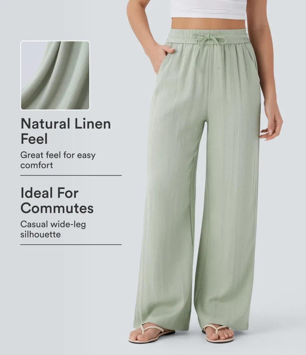2026🔥  Wide-leg, flowing, high-waisted trousers with drawstring, side pockets and a linen look