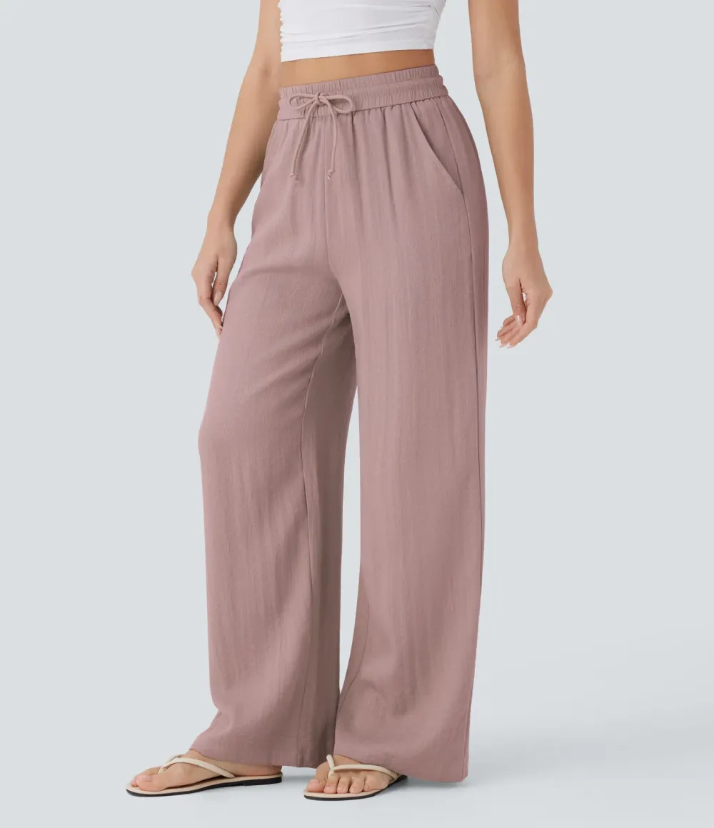 2026🔥  Wide-leg, flowing, high-waisted trousers with drawstring, side pockets and a linen look