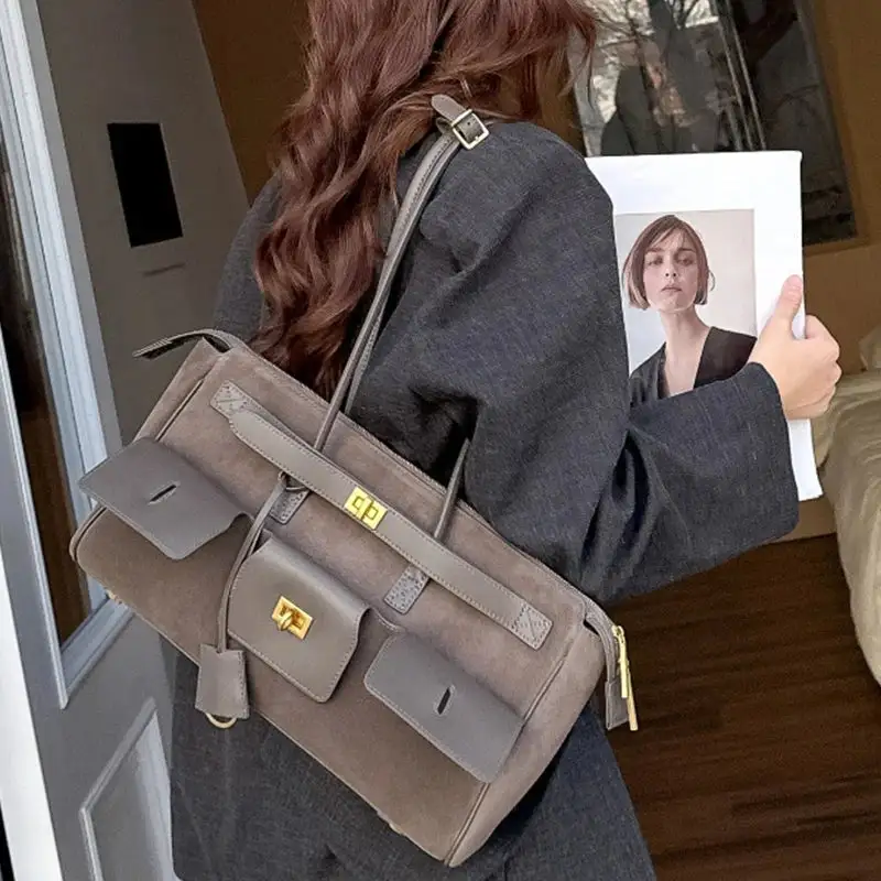 Statement Detail: Genuine Leather Buckle-Handle Handbag