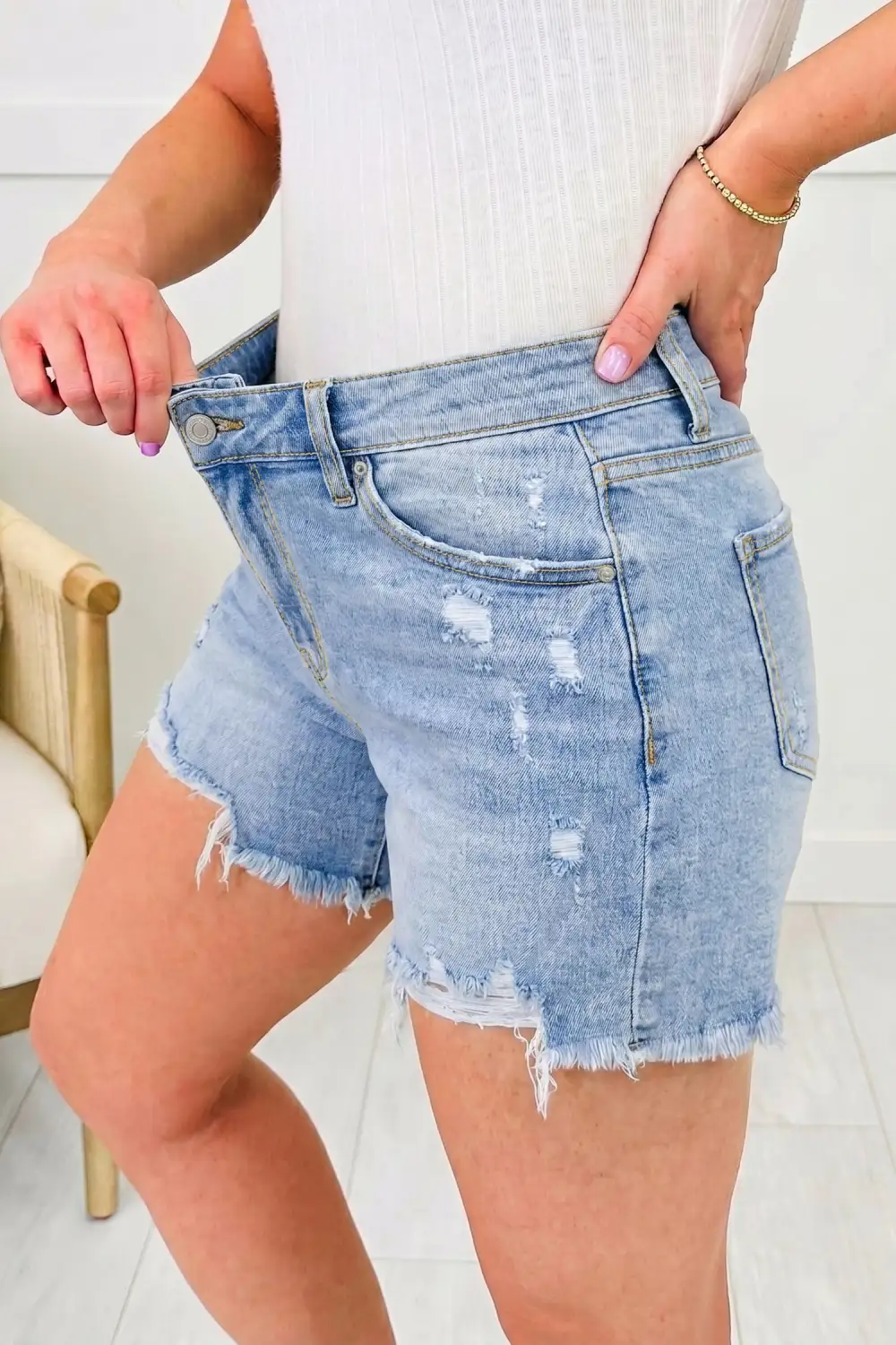 Asymmetric Raw Hem Distressed Whiskery Denim Shorts