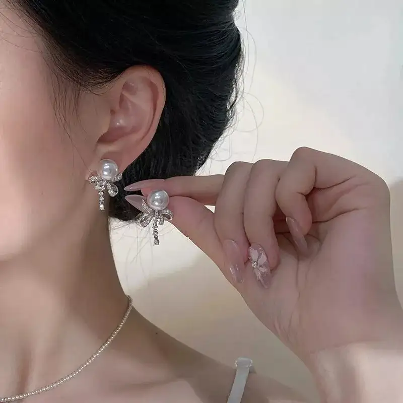 Women's Pearl and Bow Drop Earrings