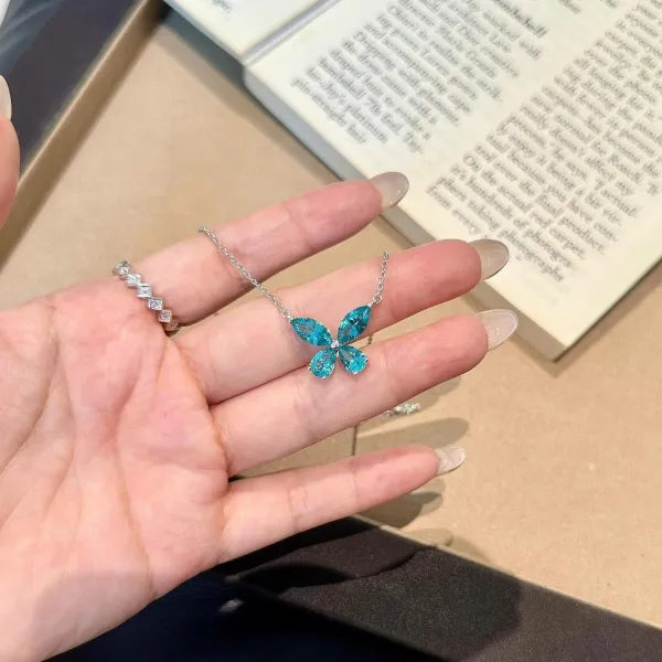 🦋 A little sparkle can change the whole look.  This stunning blue butterfly necklace catches the light beautifully from every angle. Delicate, elegant, and effortlessly eye-catching — perfect for adding a touch of color to your everyday style. ✨