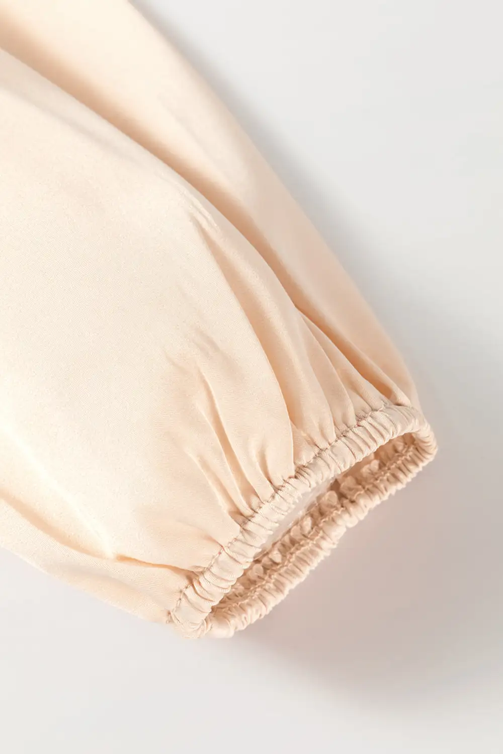 Oatmeal Lace-Up Keyhole Back Ruffled Peplum Blouse