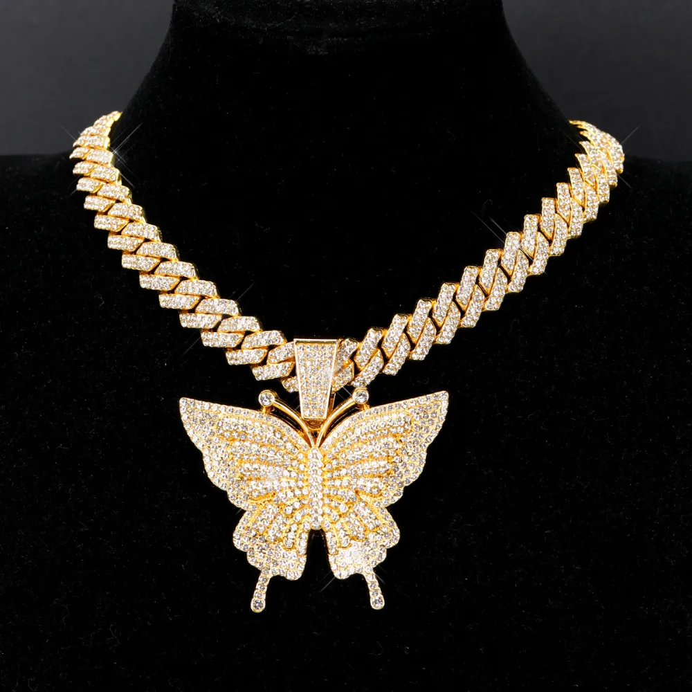 🦋 MAKE YOUR LOOK HIT DIFFERENT. ✨  Turn heads with an Iced-Out Butterfly Pendant that brings serious shine to every fit. Bold Cuban-link style. Statement butterfly design. Maximum sparkle from every angle. 💎