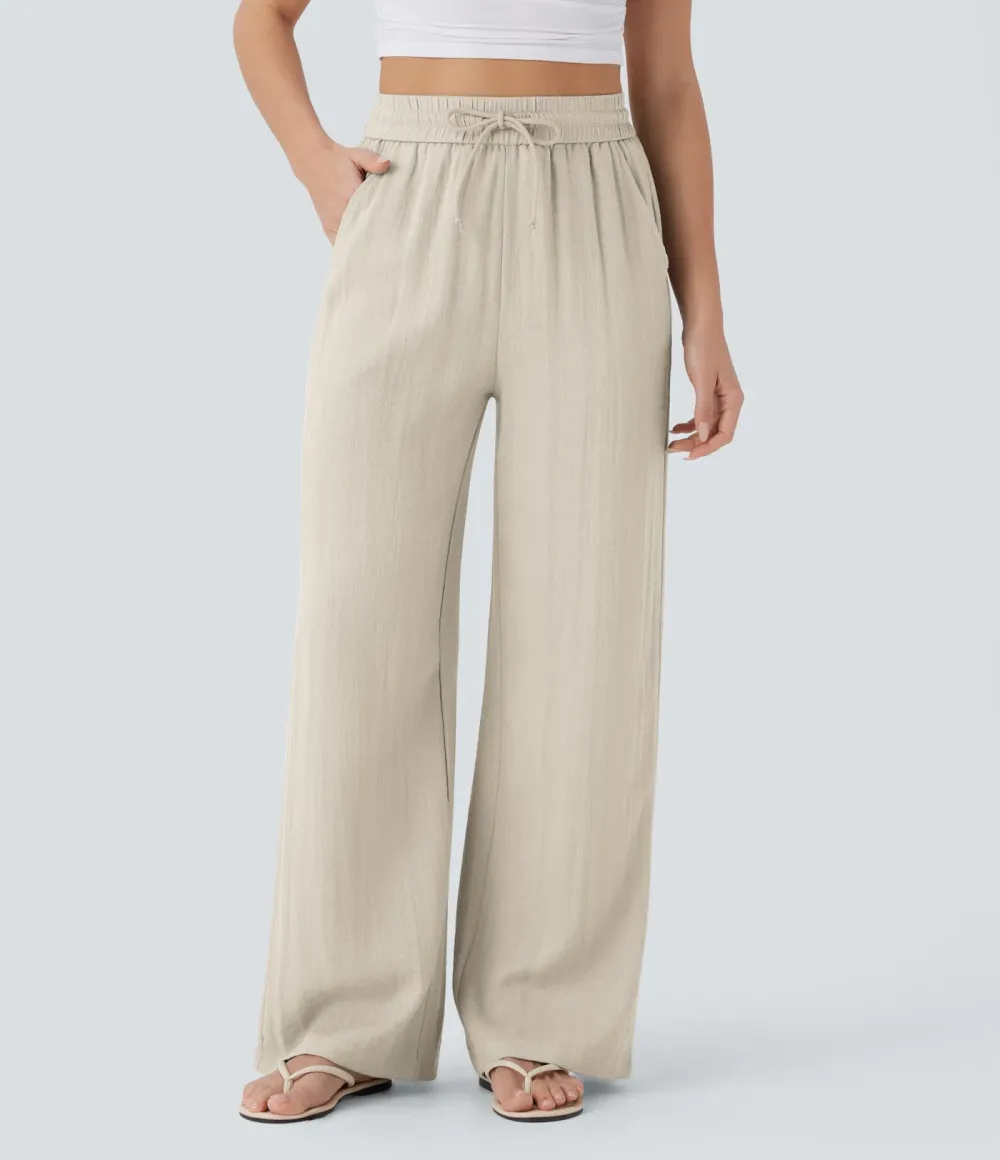 2026🔥  Wide-leg, flowing, high-waisted trousers with drawstring, side pockets and a linen look