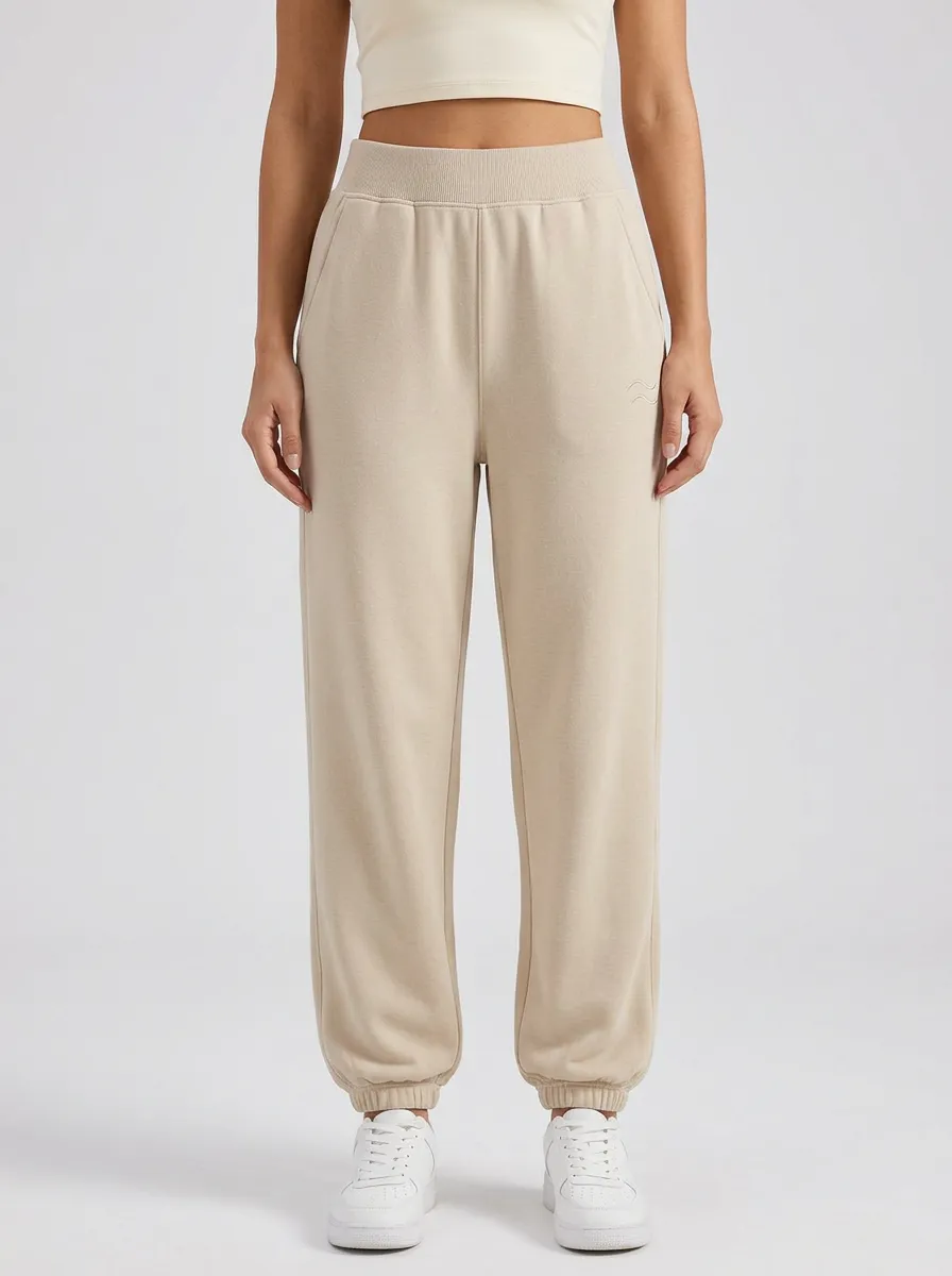 Women's Minimalist Solid Beige Embroidered Wave Jogger Pants