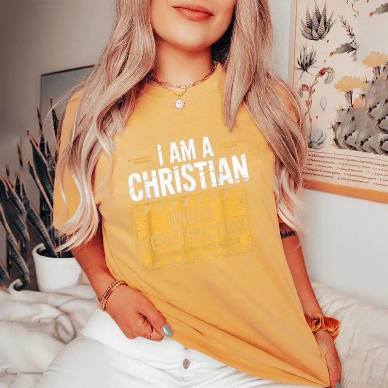 Christian Under Construction God Not Done Yet Spiritual Fun Women's Oversized Comfort T-Shirt